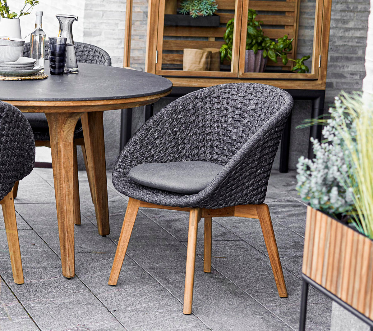 Peacock chair lifestyle by Cane-line
