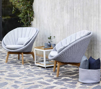 Peacock lounge chair lifestyle by Cane-line