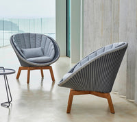 Peacock lounge chair lifestyle by Cane-line