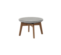 Peacock side table footstool by Cane-line