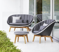 Peacock side table footstool lifestyle by Cane-line