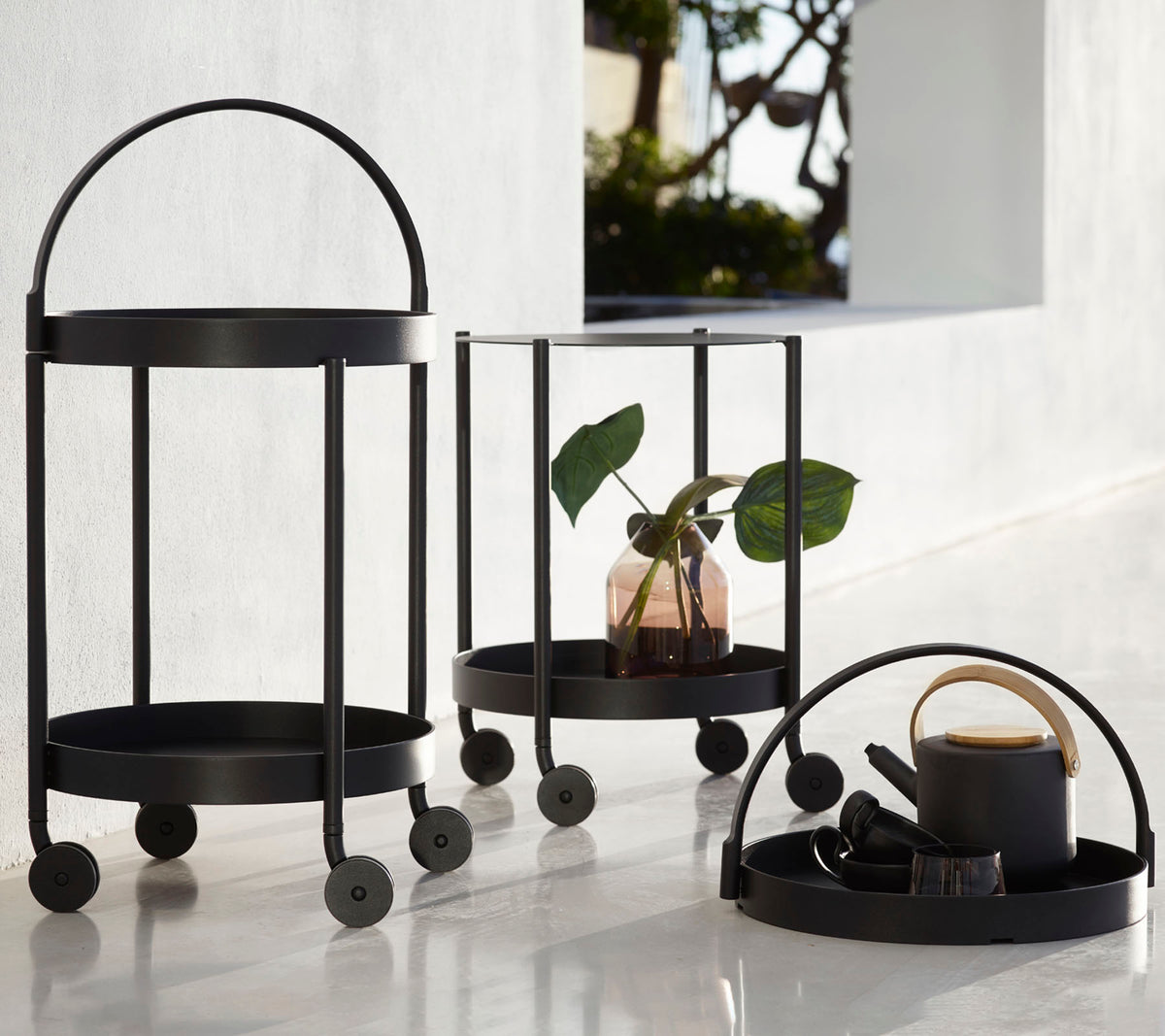 Roll trolley by Cane-line, designed by Welling/Ludvik
