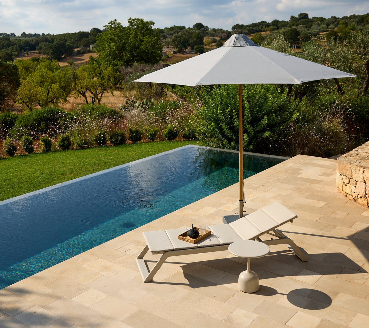 Siesta sunbed lifestyle image by Cane-line