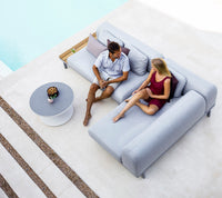 Space compact 2-module corner sofa with side table outdoor sectional sofa by Cane-line, designed by Foersom & Hiort-Lorenzen MDD