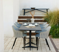 Sticks aluminium bench in an outdoor dining setting