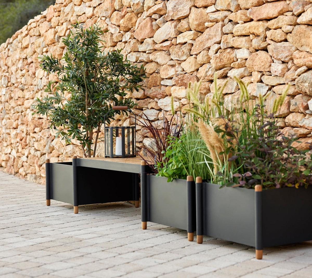 Sticks bench and planters in lava grey