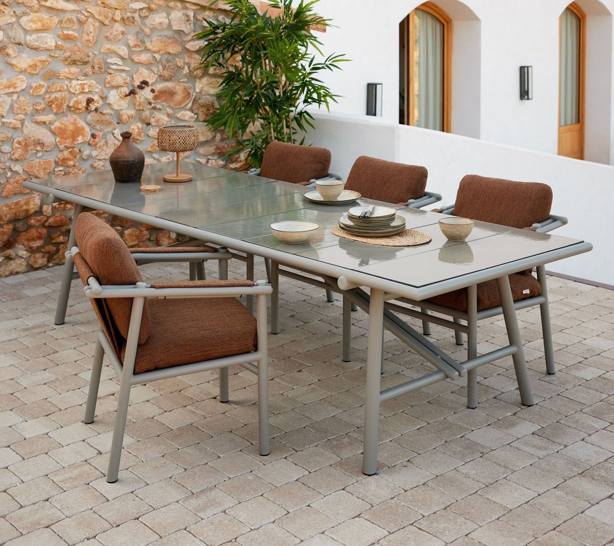 Sticks dining table aluminium lifestyle image by Cane-line
