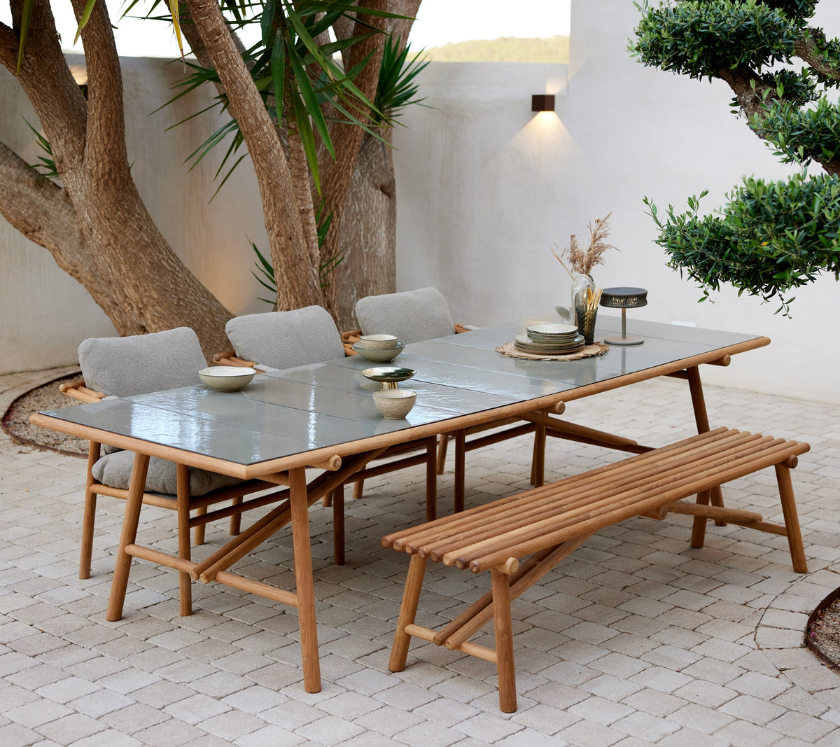 Sticks dining table teak lifestyle image by Cane-line