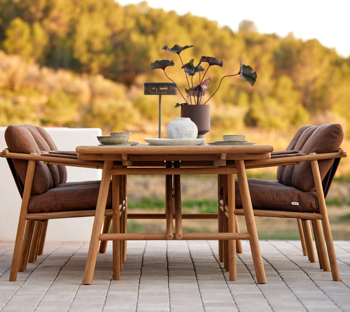 Sticks dining table teak lifestyle image by Cane-line