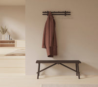 Sticks coat rack in an entry setting