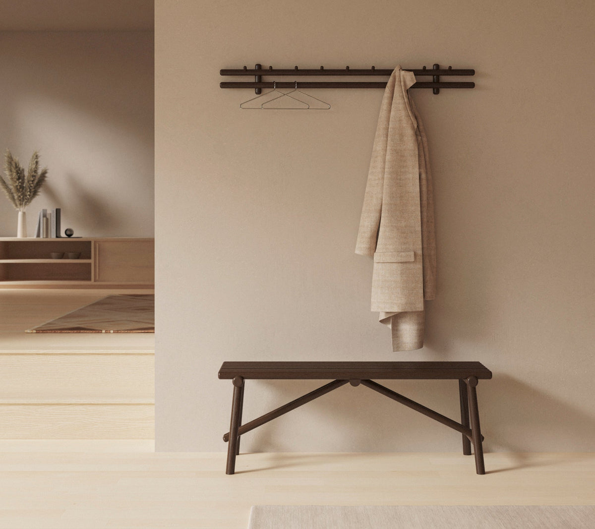 Sticks coat rack 120 cm in an indoor setting