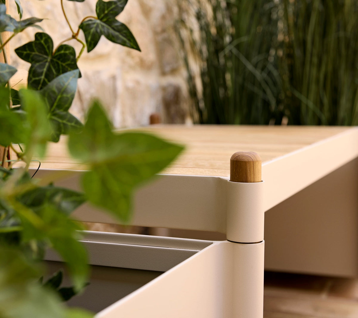 Sticks bench with planters in an outdoor setting