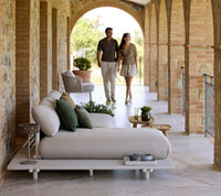 Sticks platform aluminium lifestyle image with Illusion lamp and Royal coffee table by Cane-line