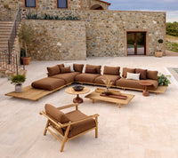 Sticks platform lounge and lounge chair lifestyle image by Cane-line