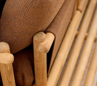 Sticks platform lounge teak lifestyle image by Cane-line