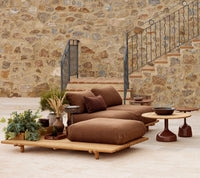 Sticks platform teak lounge lifestyle image with Glaze coffee table by Cane-line