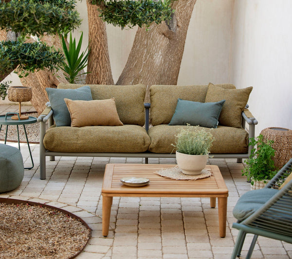 Sticks 2-seater sofa in an outdoor setting
