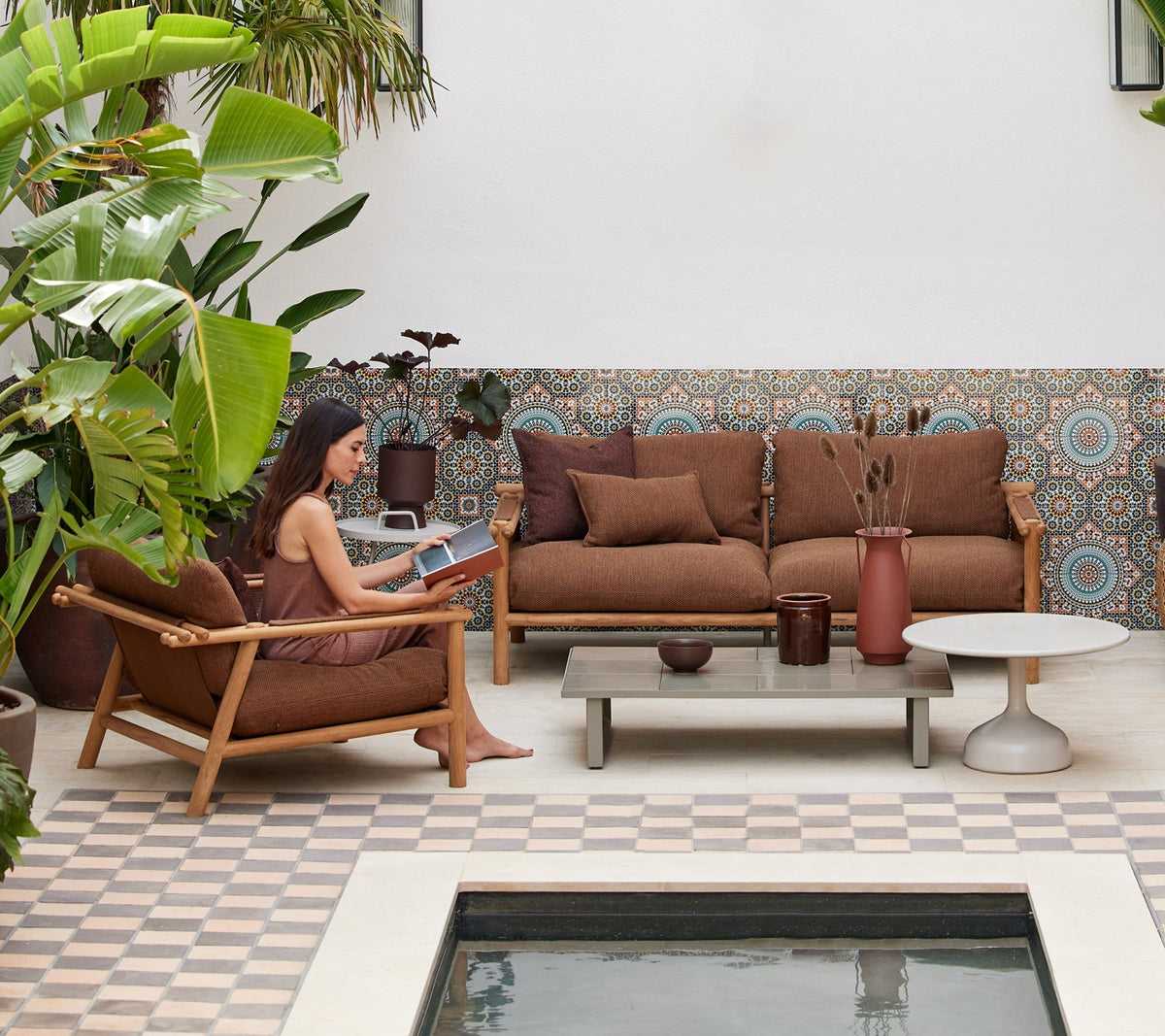 Sticks outdoor lounge setting in teak