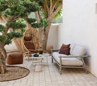 Sticks lounge chair in a complete outdoor setting