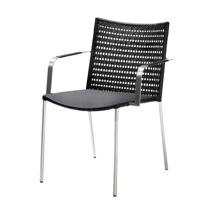 Straw dining chair with armrest by Cane-line, designed by Foersom & Hiort-Lorenzen MDD