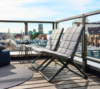 Traveller folding lounge chair by Cane-line, designed by Foersom & Hiort-Lorenzen MDD