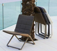 Traveller folding lounge chair by Cane-line, designed by Foersom & Hiort-Lorenzen MDD