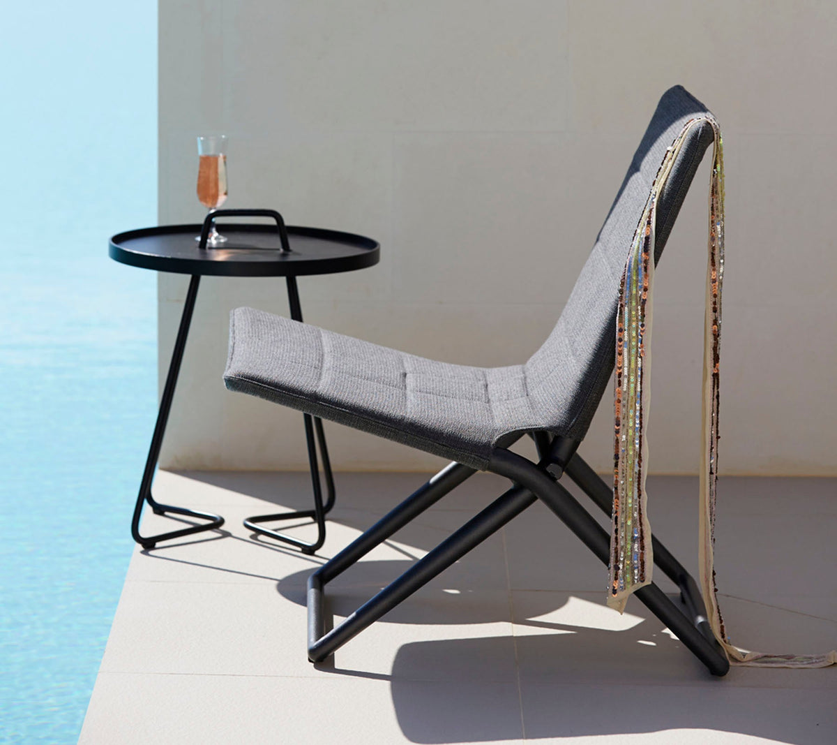 Traveller folding lounge chair by Cane-line, designed by Foersom & Hiort-Lorenzen MDD