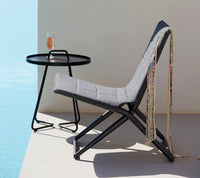 Traveller folding lounge chair by Cane-line, designed by Foersom & Hiort-Lorenzen MDD