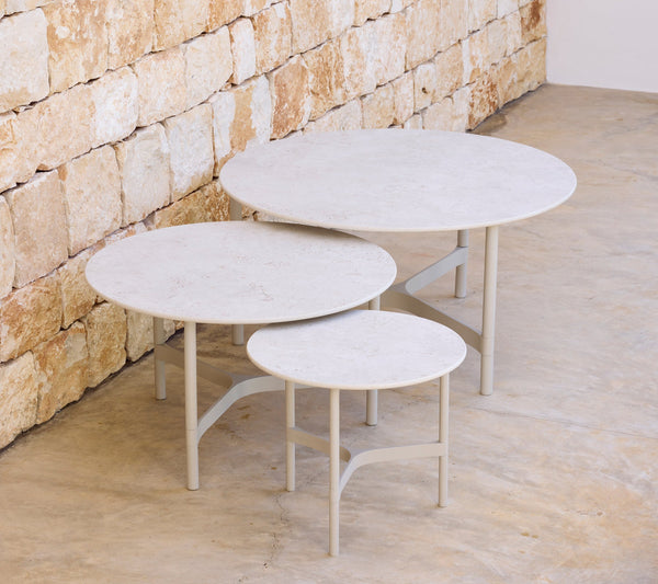 Cane-line Twist coffee tables in a modern outdoor lounge