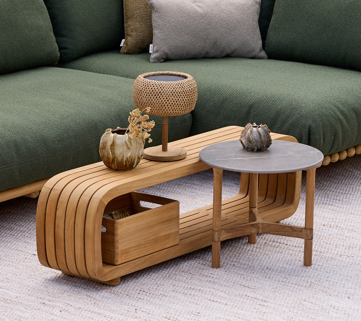 Cane-line Twist coffee table in a lounge setting