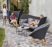 Cane-line Twist coffee tables in a coordinated outdoor lounge