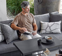 Outdoor coffee table by Cane-line