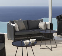 Diamond 2-seater sofa outdoor lifestyle image by Cane-line