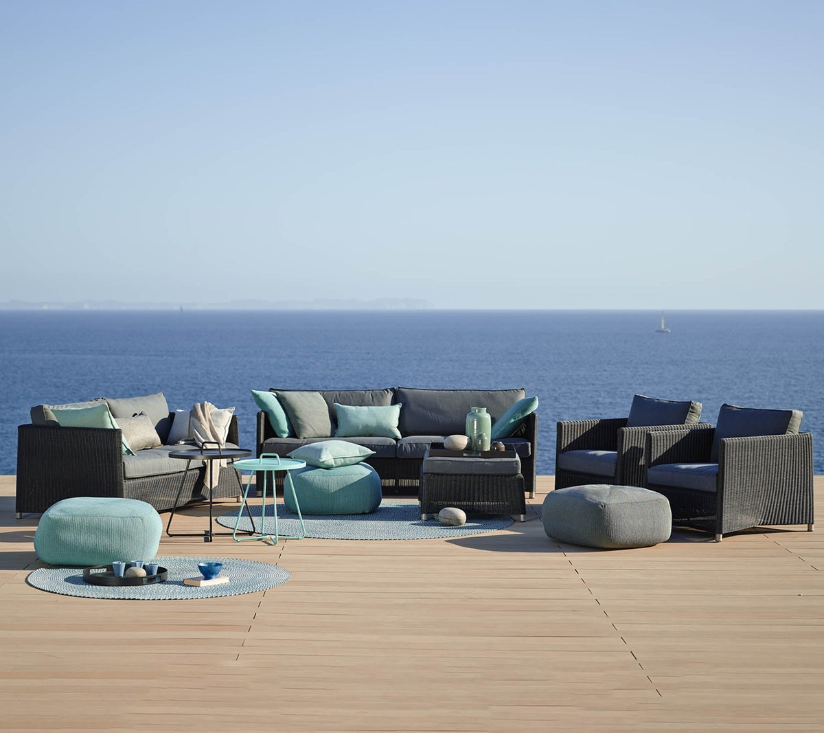 Diamond 2-seater sofa terrace lifestyle image by Cane-line