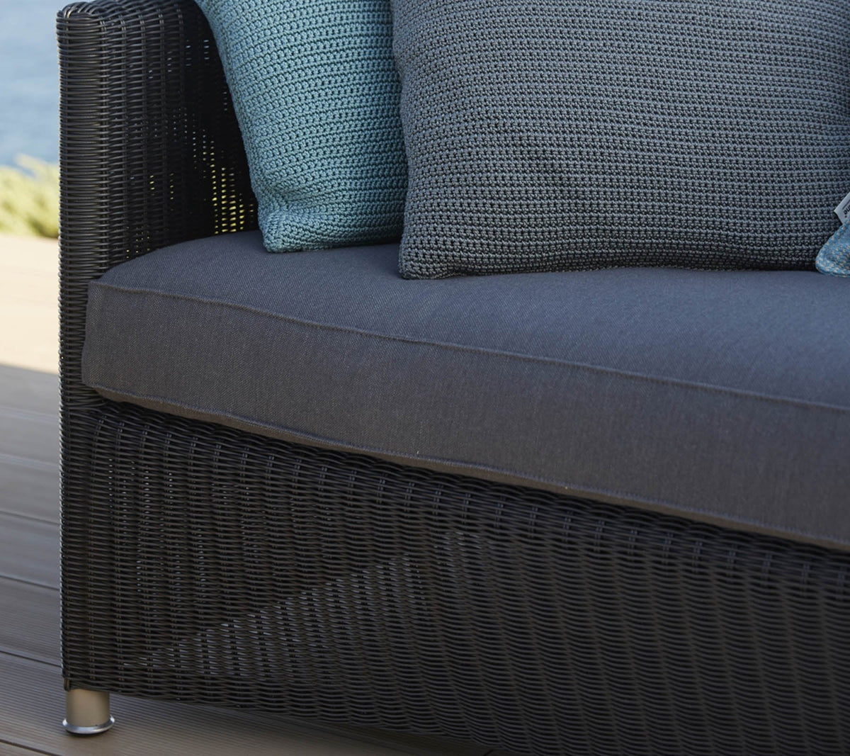 Diamond 2-seater sofa patio lifestyle image by Cane-line