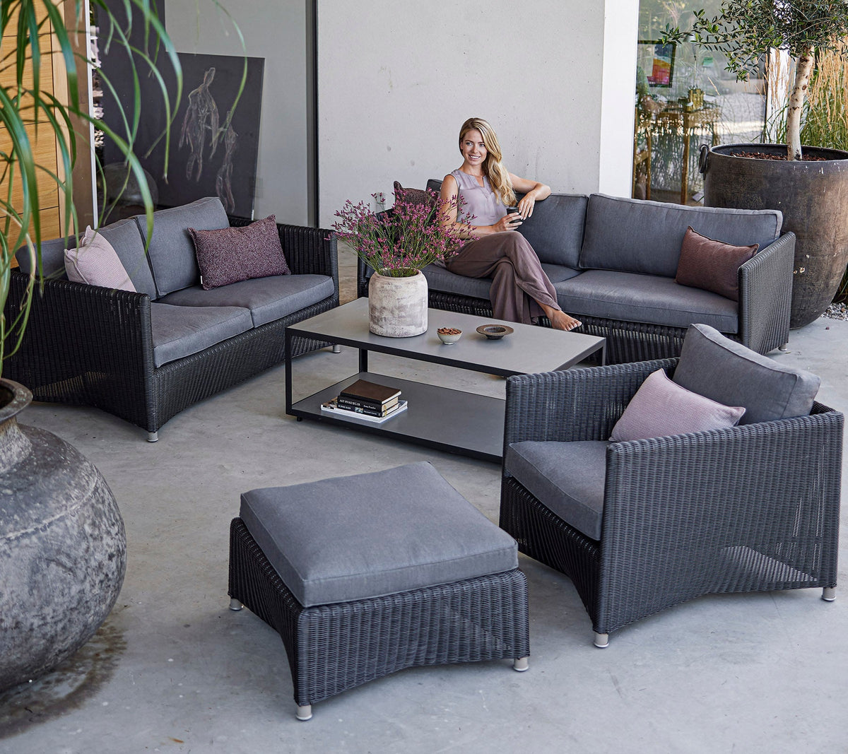 Diamond 2-seater sofa outdoor lounge lifestyle image by Cane-line
