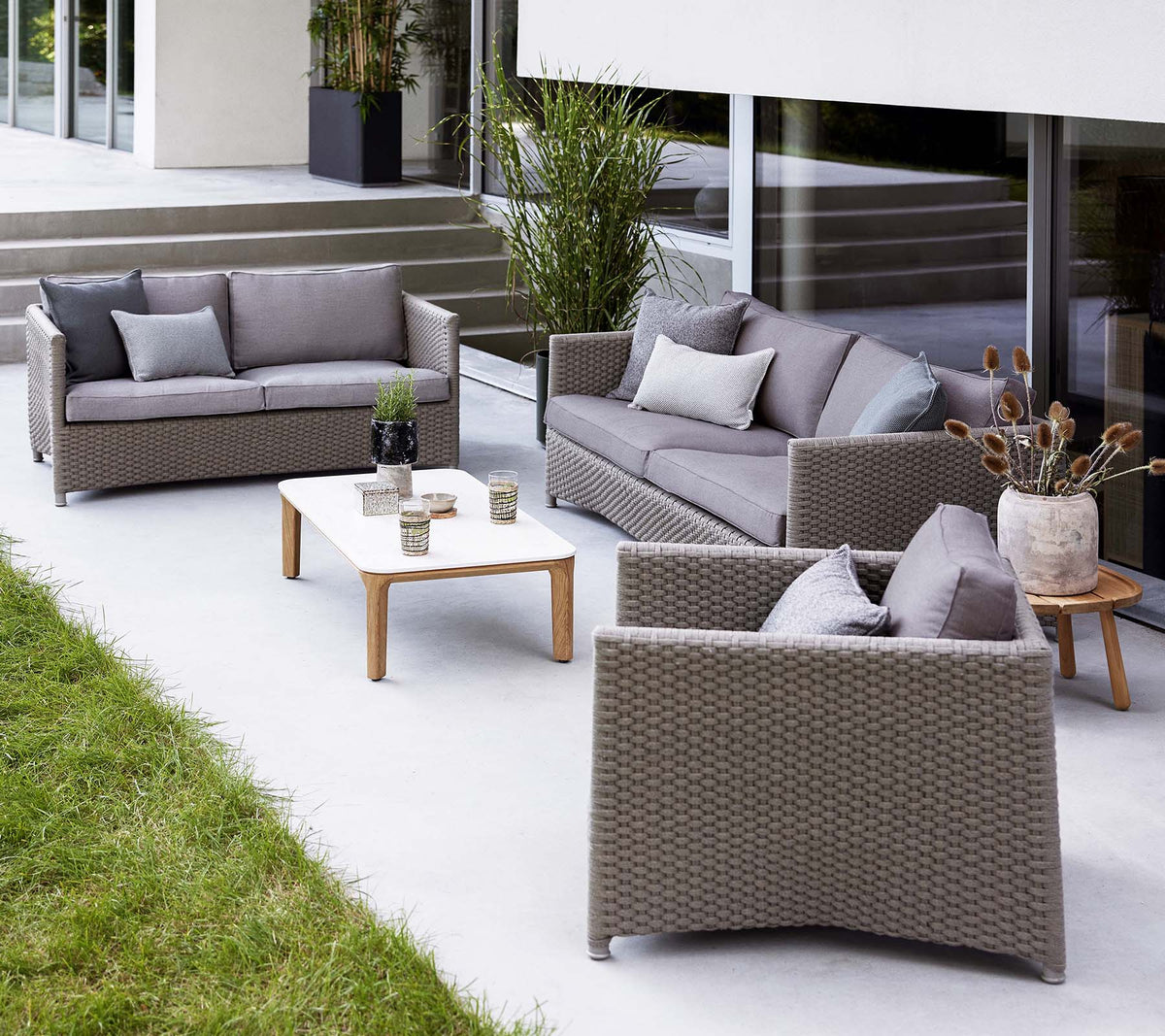 Diamond 2-seater sofa and lounge chair lifestyle image by Cane-line