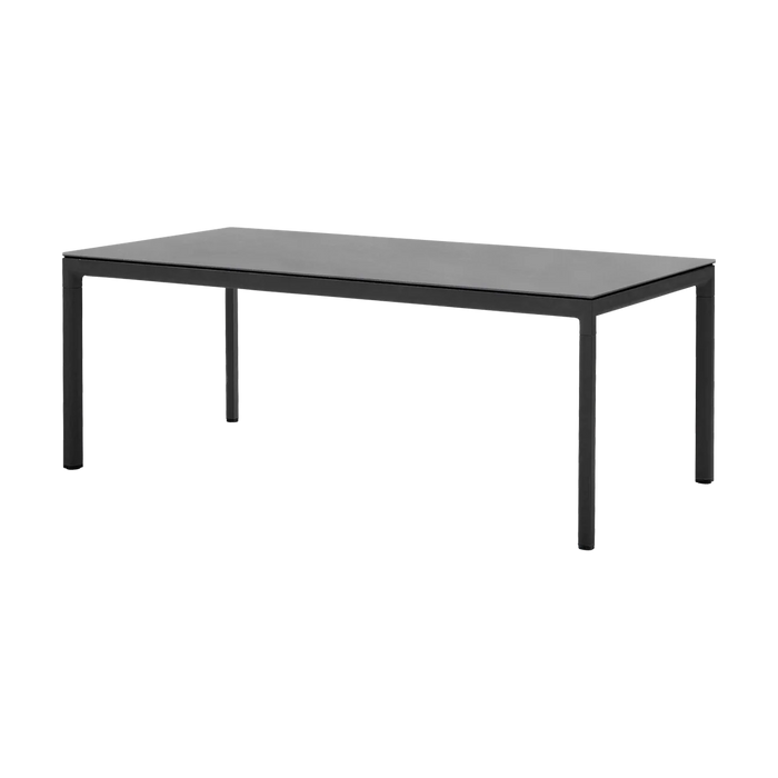 Drop dining table by Cane-line
