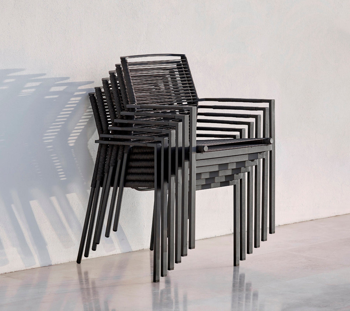 Edge armchair outdoor dining chair by Cane-line, designed by Strand+Hvass
