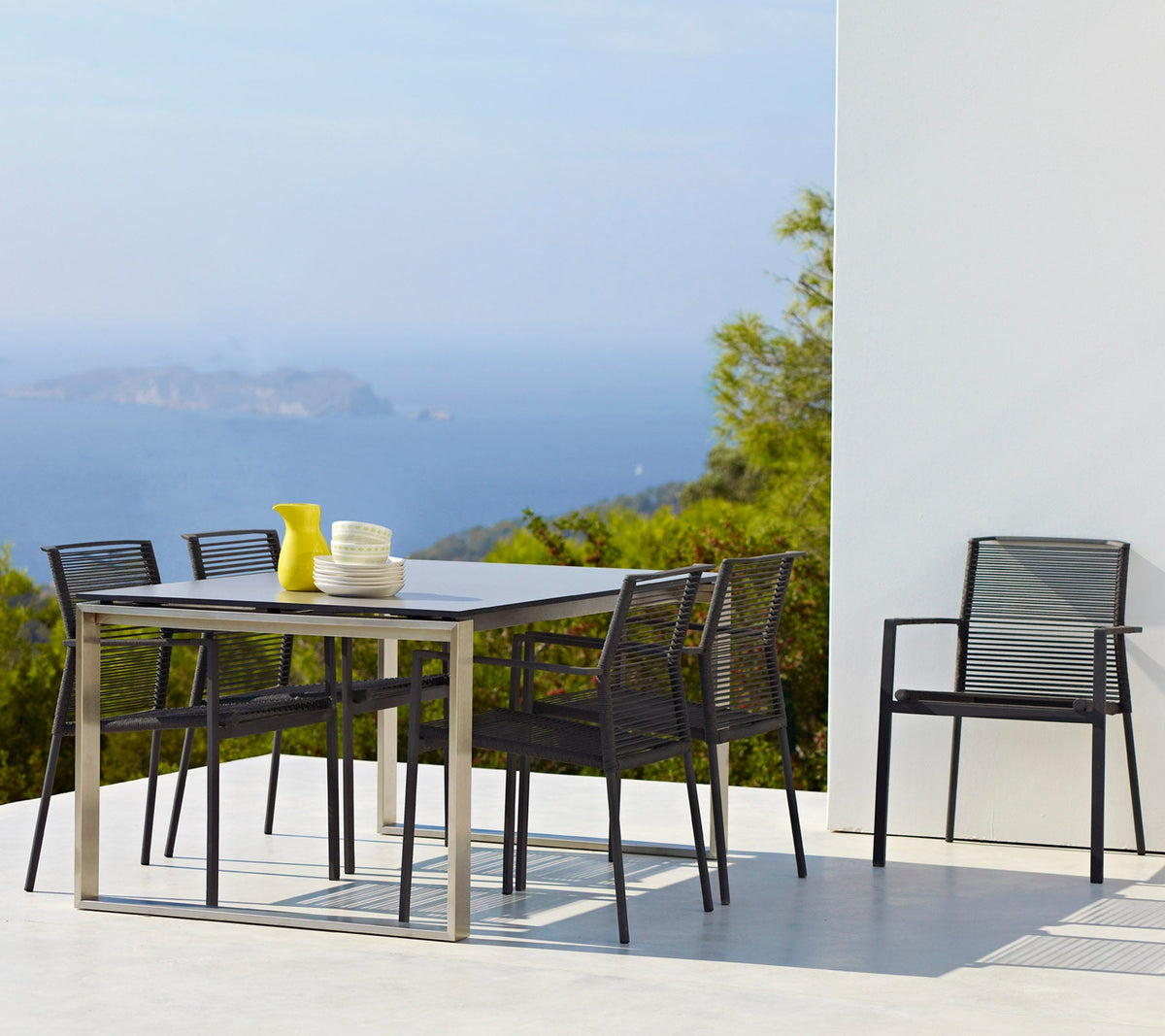 Edge armchair outdoor dining chair by Cane-line, designed by Strand+Hvass