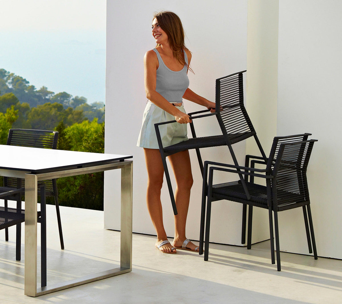 Edge armchair outdoor dining chair by Cane-line, designed by Strand+Hvass