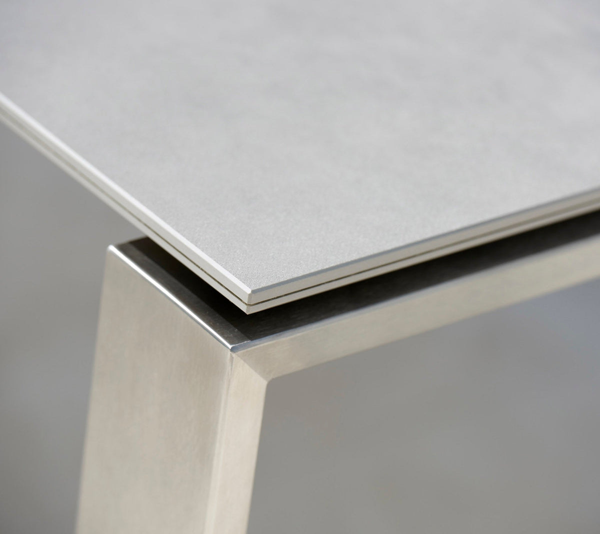 Edge dining table with 120 cm extensions outdoor dining table by Cane-line, designed by Strand+Hvass