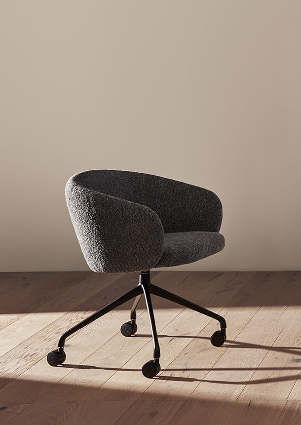 Huma Upholstered Swivel Armchair With Casters