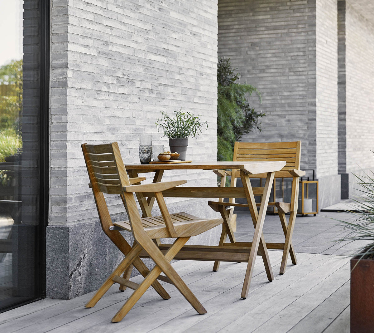 Flip folding armchair by Cane-line