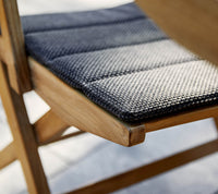 Flip folding armchair by Cane-line