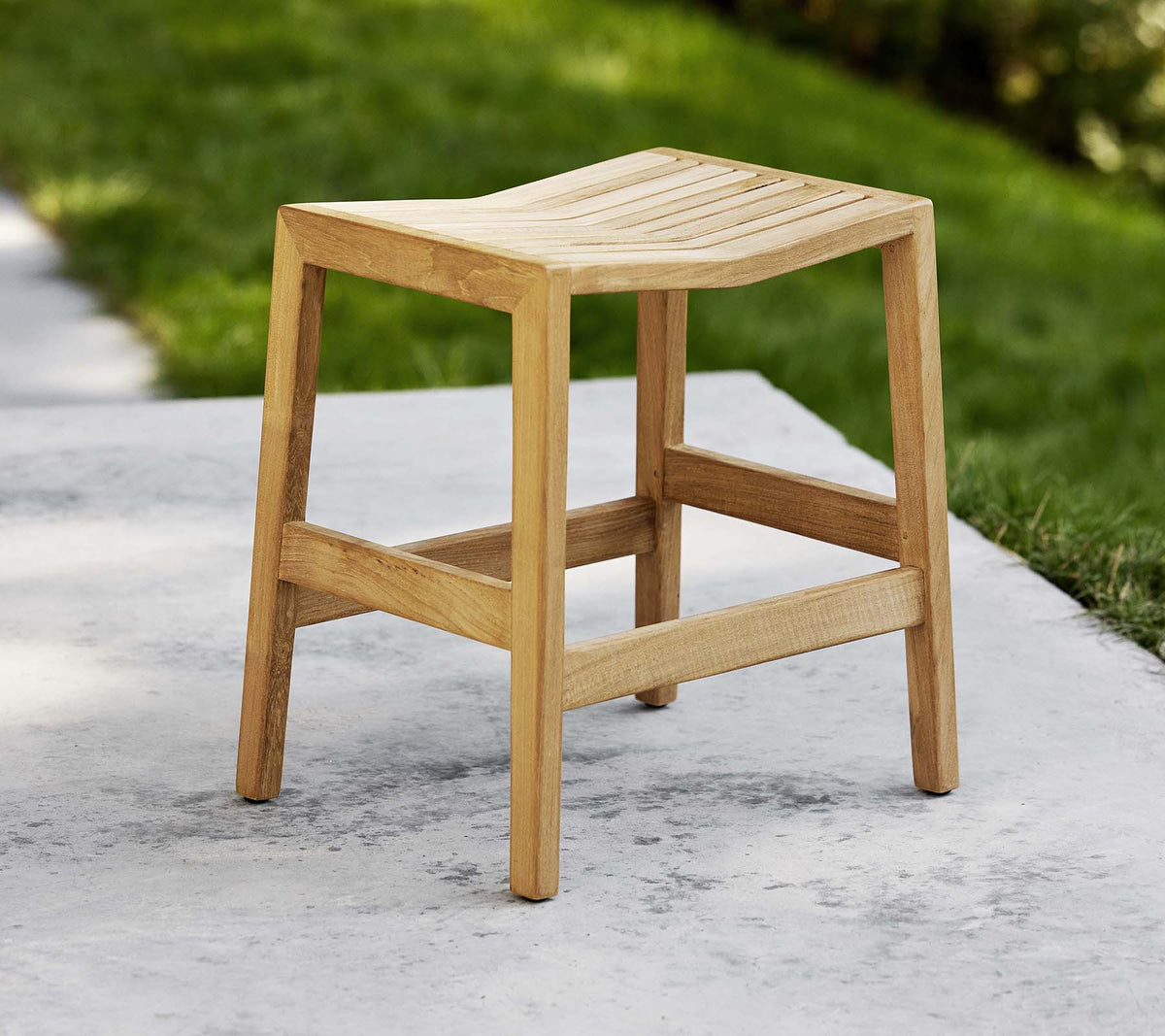 Flip stool by Cane-line