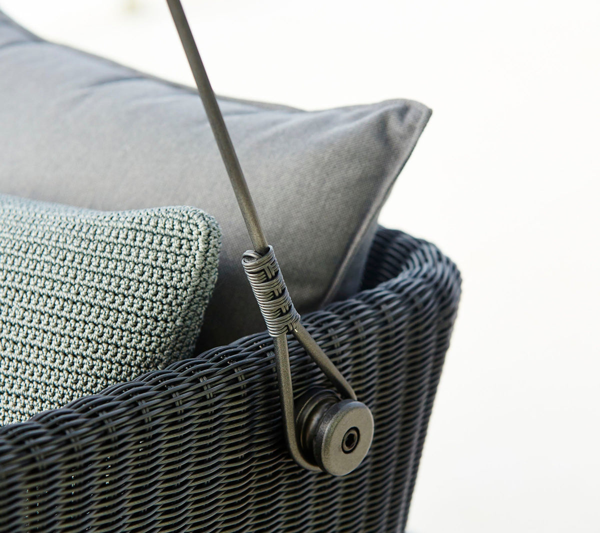 Cave Swing Sofa outdoor swing sofa by Cane-line, designed by Jesper K. Thomsen