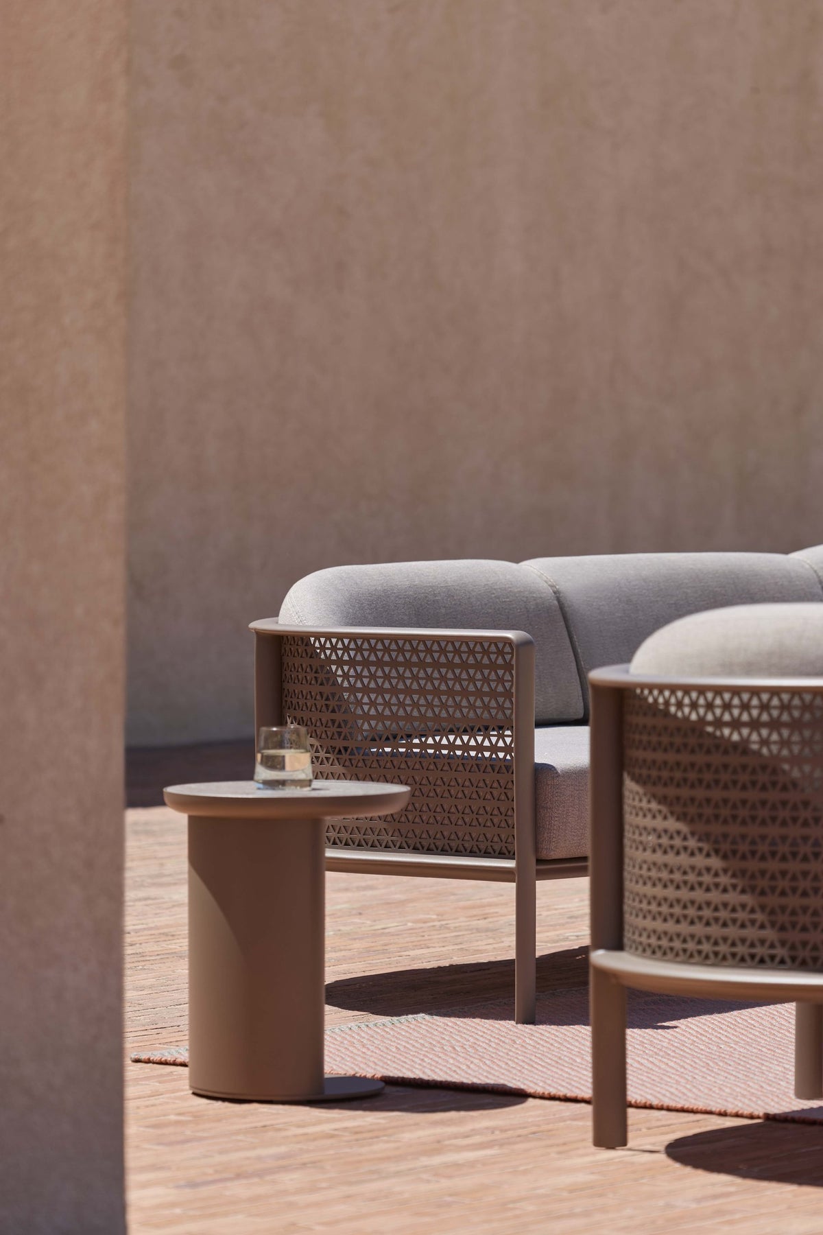 Gandia Blasco Arco 3 Seat Sofa in Bronze with Arena C Table outdoors