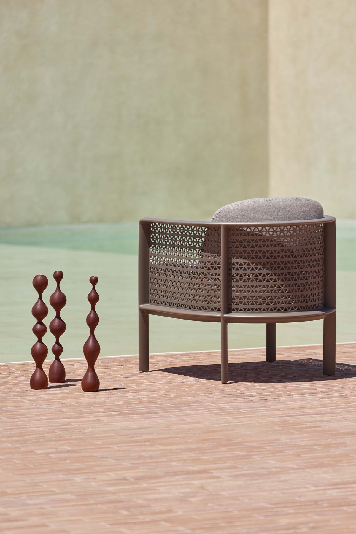 Gandia Blasco Arco Club Armchair in Bronze, outdoor front view
