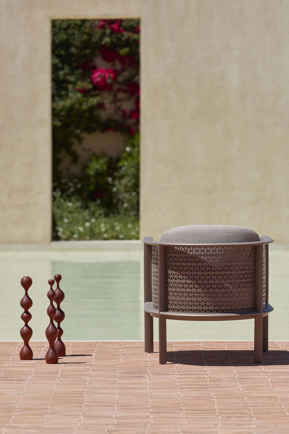 Gandia Blasco Arco Club Armchair in Bronze, outdoor side view